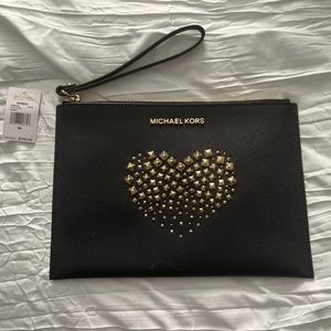 Michael Kors black clutch. Brand new.